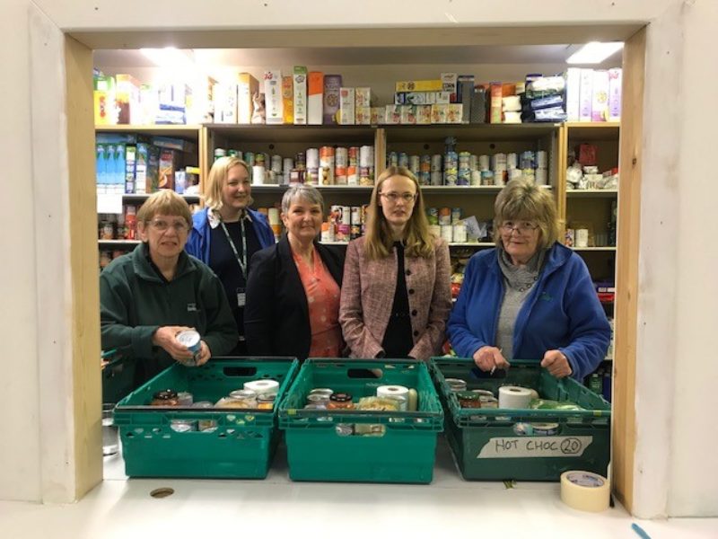 Annette Smith Morecambe Bay Foodbank Manager (3rd left), Cat and members of the foodbank team.
