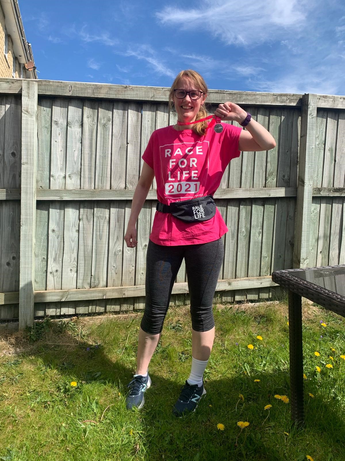 Cat raised nearly £500 last month for Macmillan by taking part in the 5K Race for Life