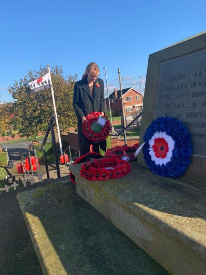 Cat places a wreath at the war memorial in Preesall.