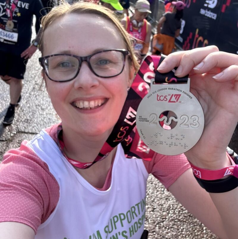 Cat with her medal for finishing the London Marathon